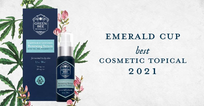 Image shows photo of Green Bee Botanicals Renewing Serum with cannabis leaves and pink flowers and text: Emerald Cup Winner BEST Cosmetic Topical 2021